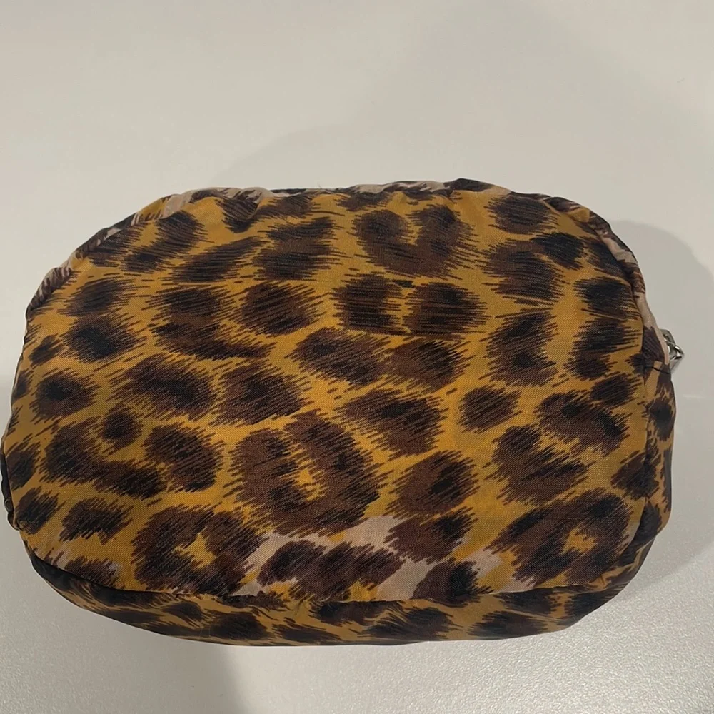 Nylon zipper tote with exterior zipper pocket. In Leopard. NWOT